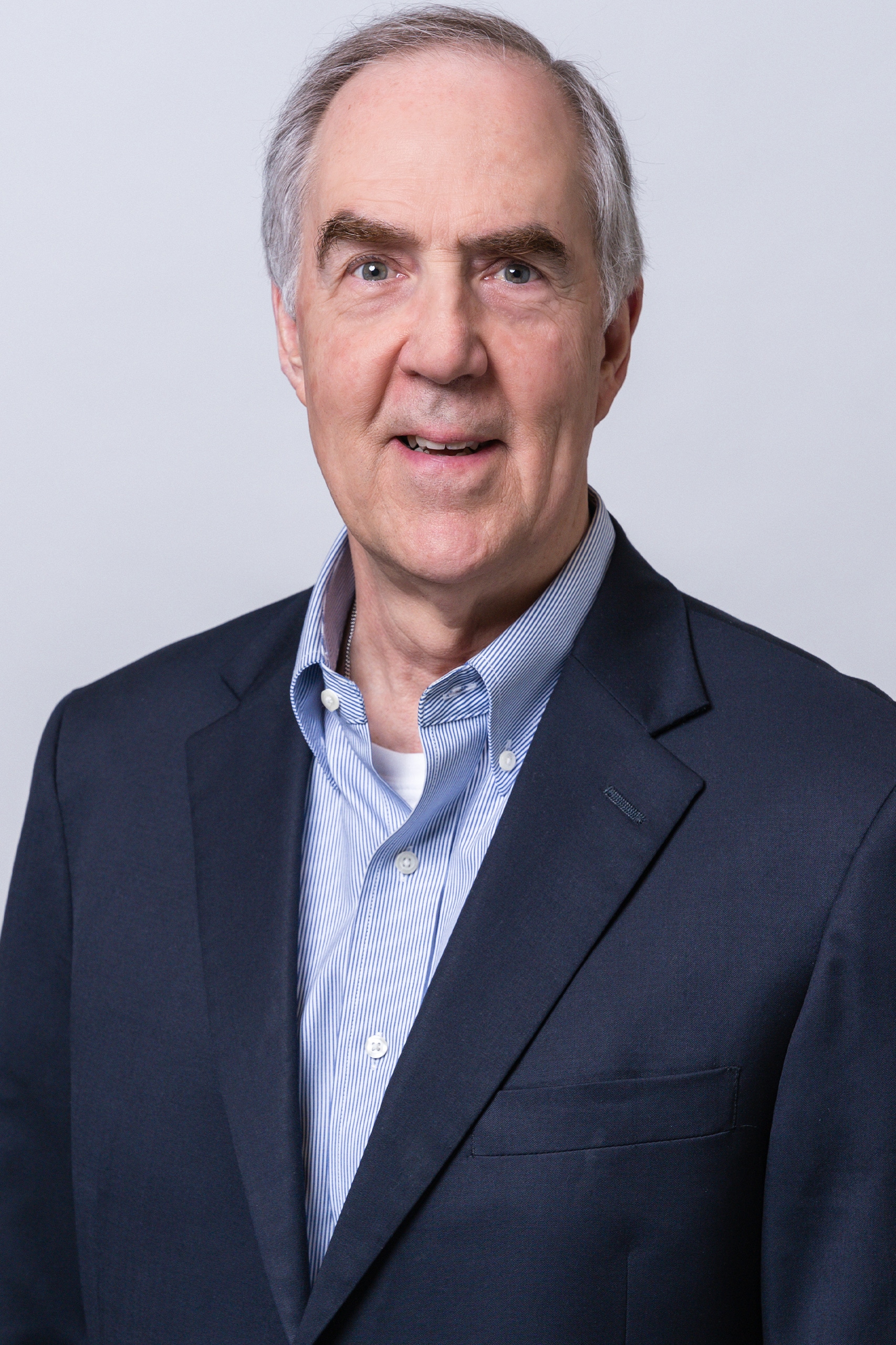 a man wearing a suit and tie a man wearing a suit and tie