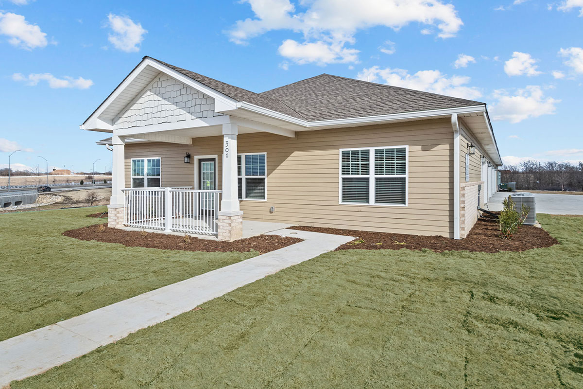 a large lawn in front of a house